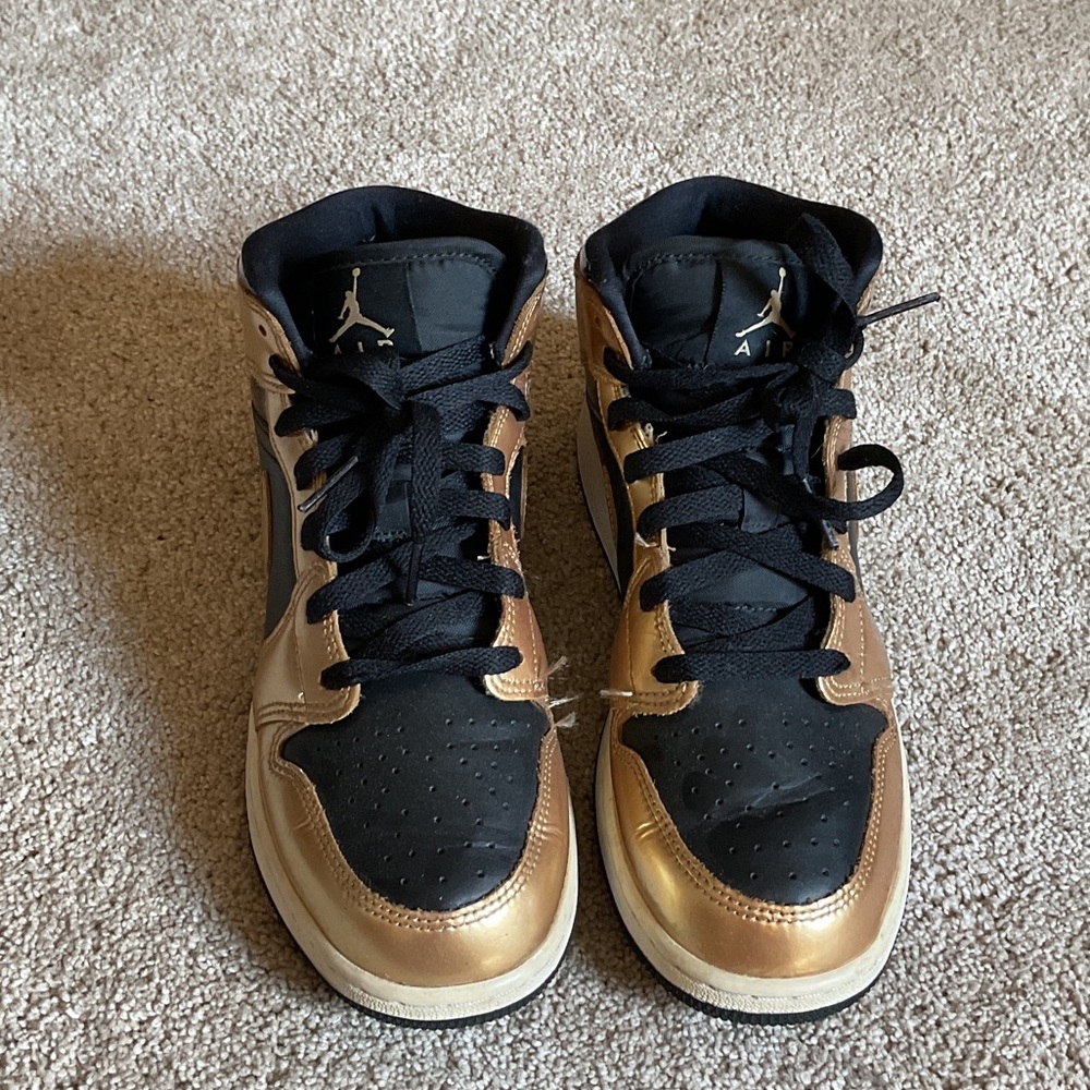 Air Jordan Black and Gold Sneakers